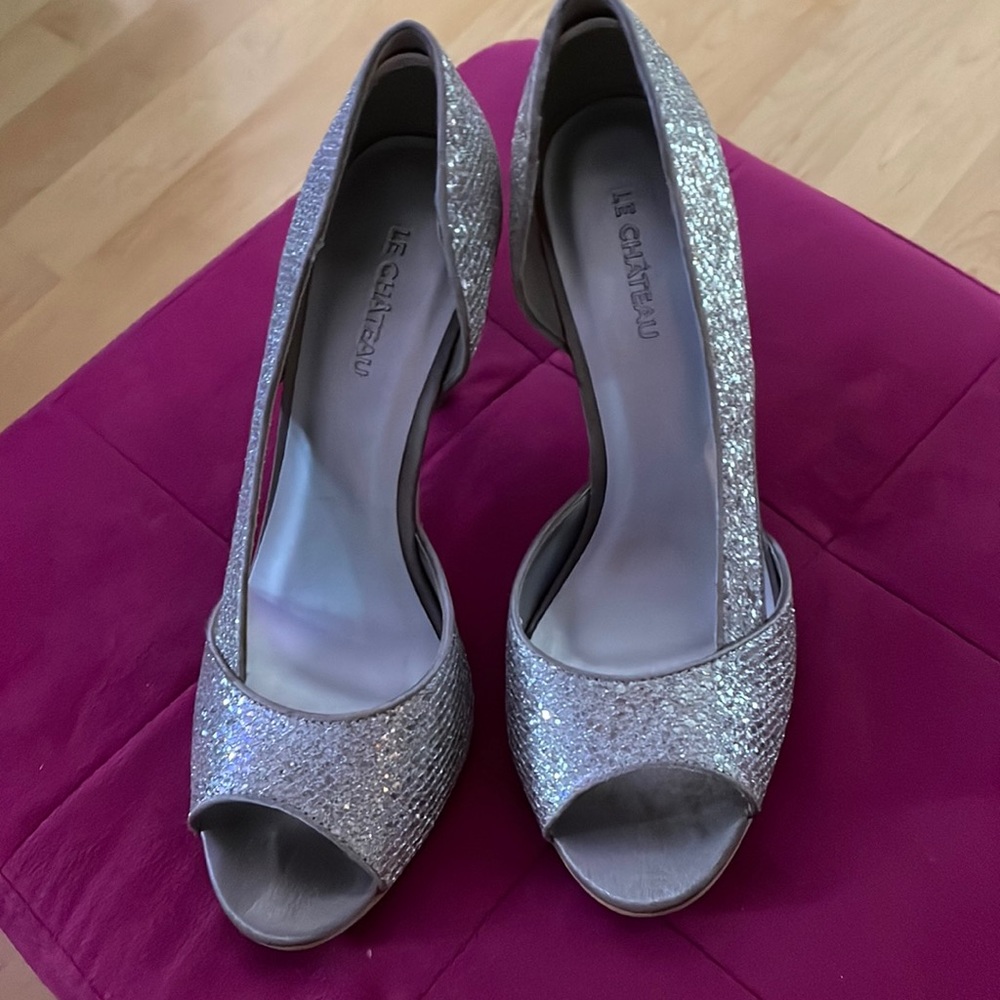 Silver high heels size 8. Worn once!